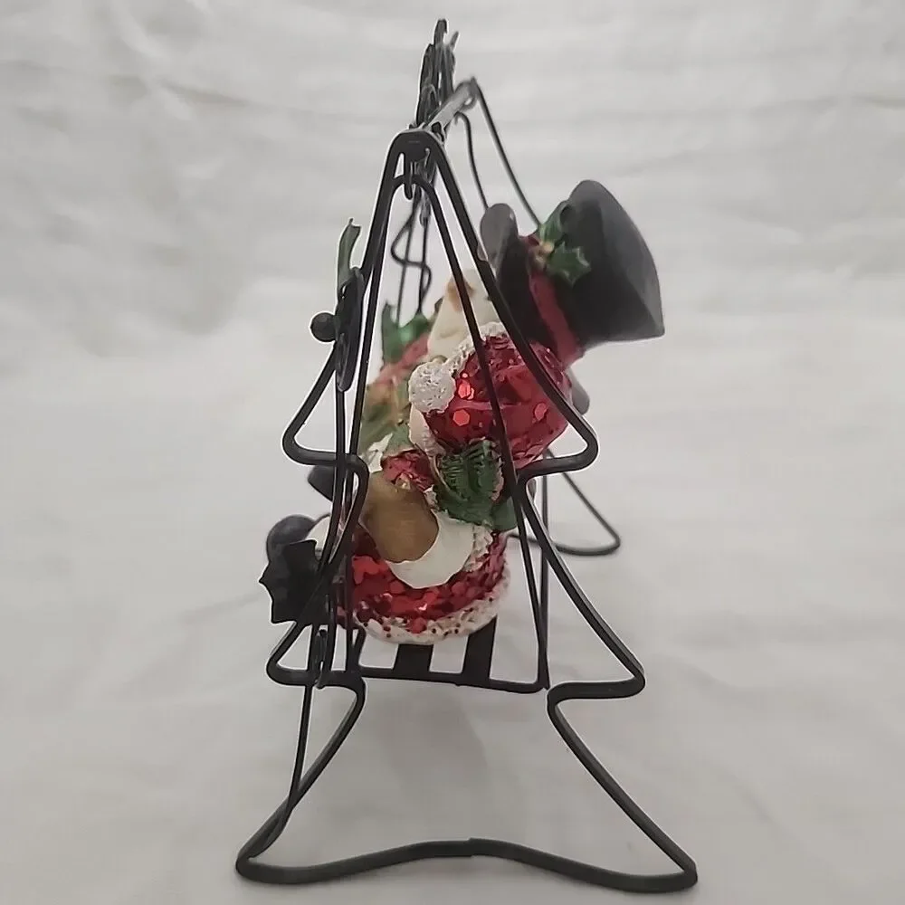 Swinging Snowman Couple Adorned With Glitter, Snowflakes, Bells, And Holly Berry
